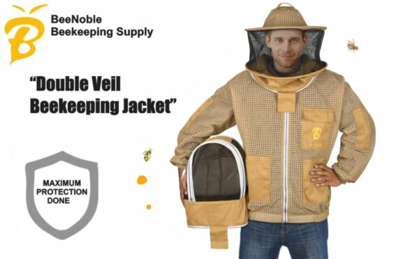 Commercial beekeeper wearing khaki bee jacket during apiary work